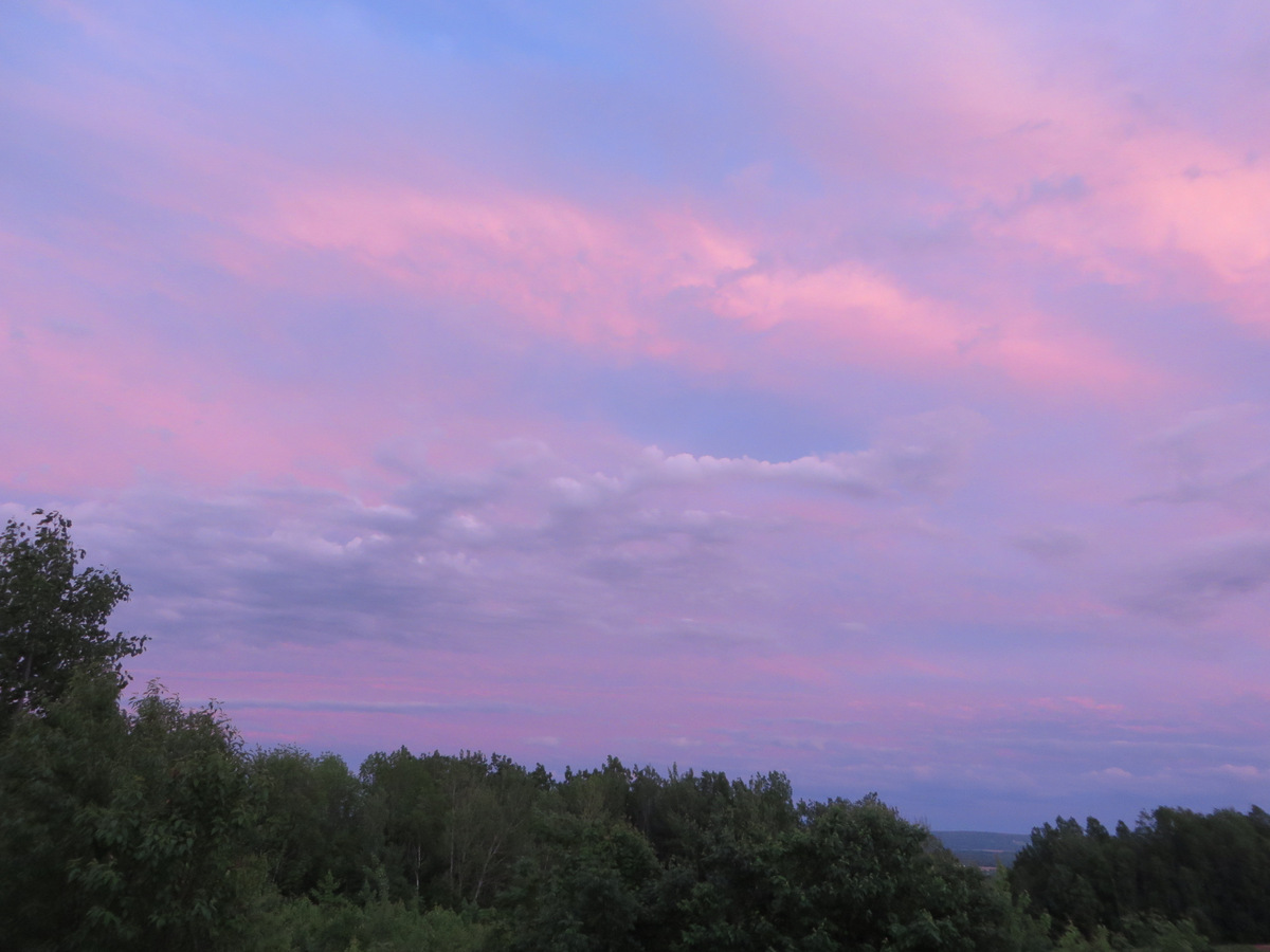 Unusual pastel sunset. Most are more vivid. This could be taken as a dawn shot, not one at dusk.
